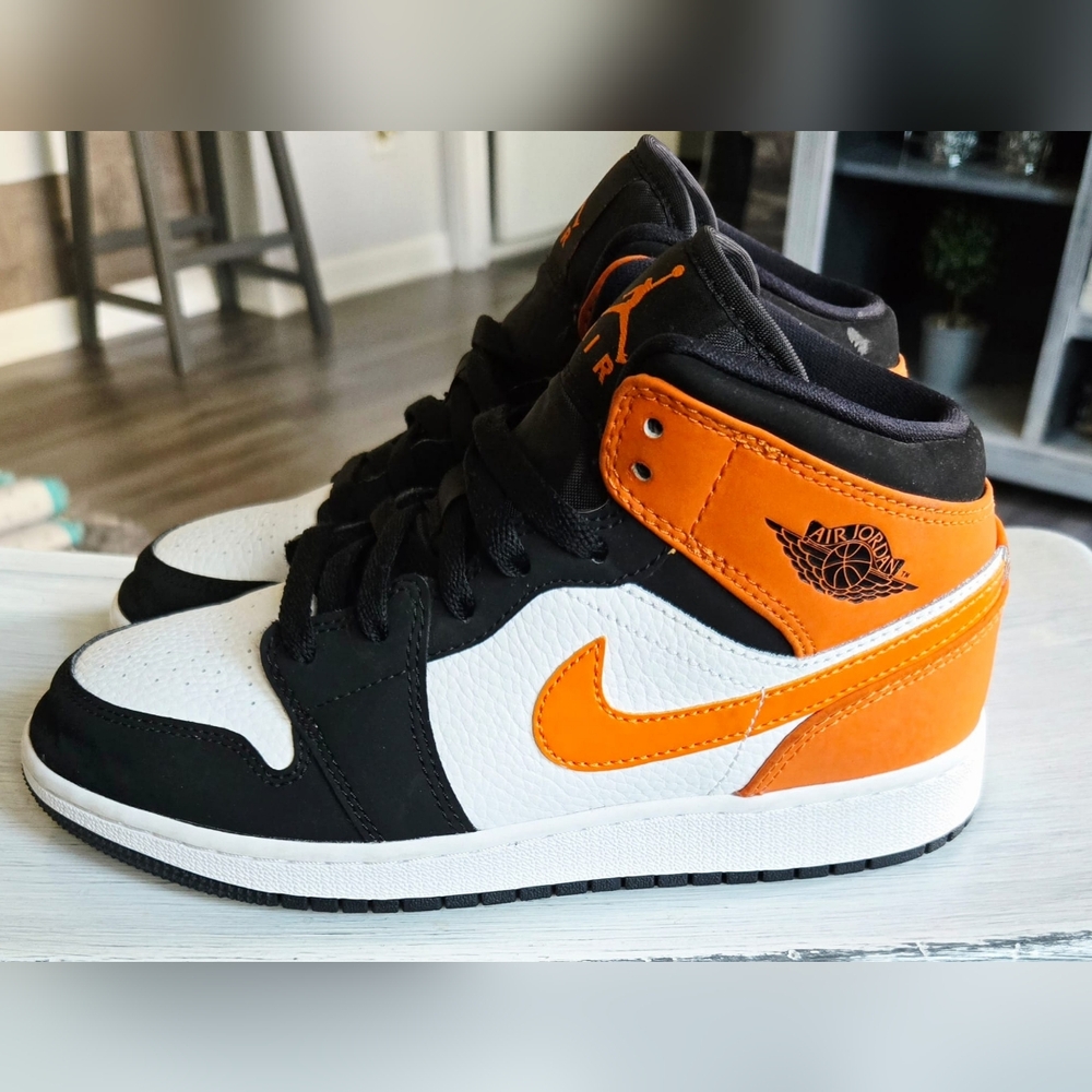 Jordan 1 Kids' Black, White, and Orange Sneakers
